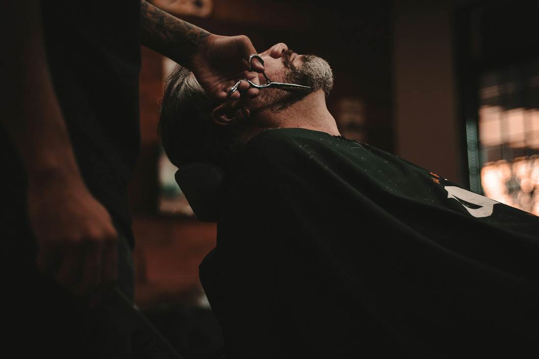 Hot towel beard trim in the chair