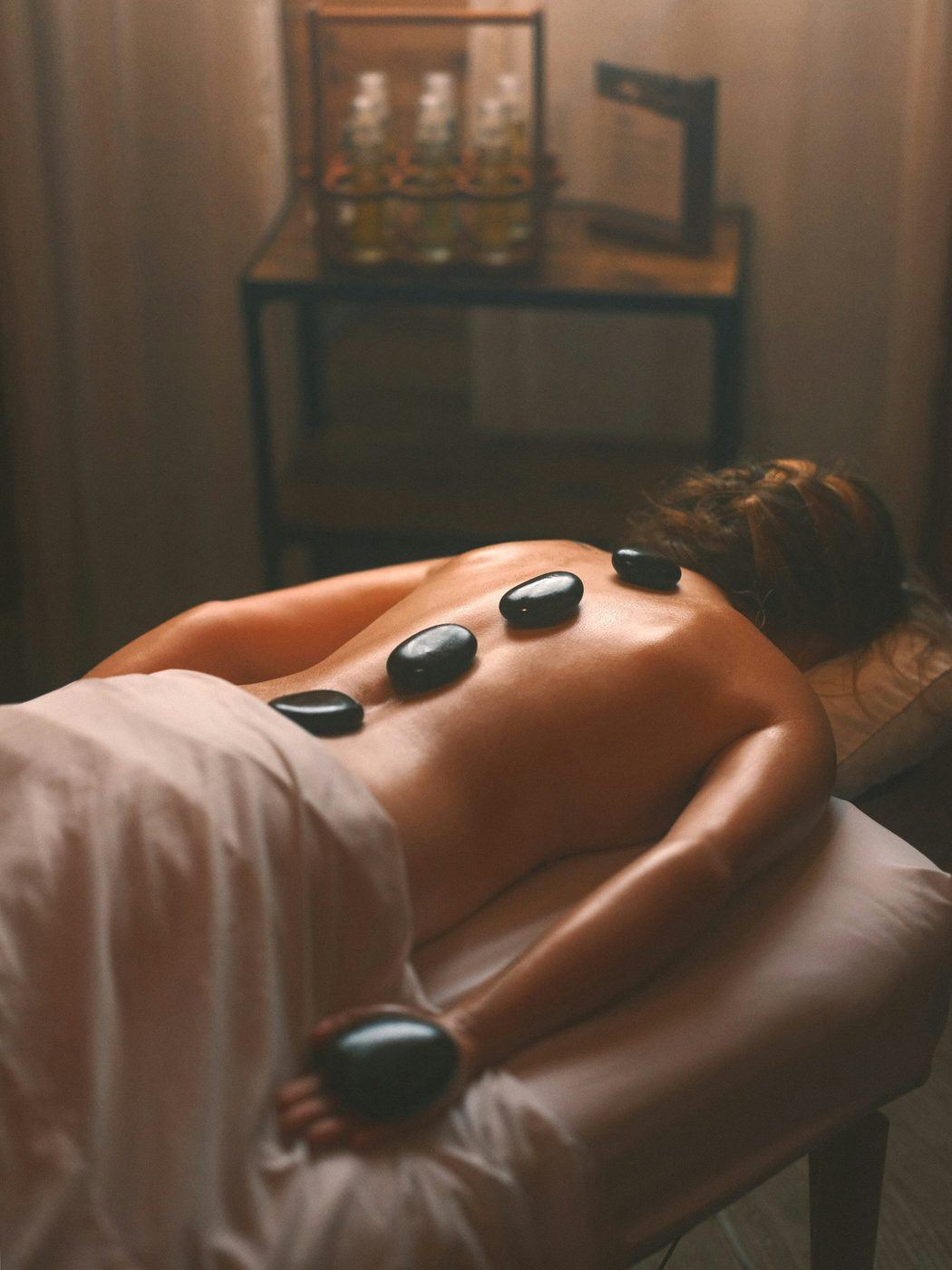 A warm hot stone massage