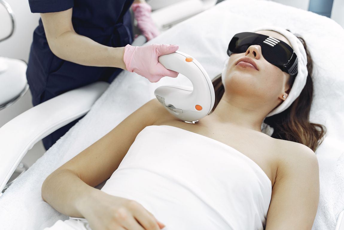 A guest receiving a gentle laser treatment
